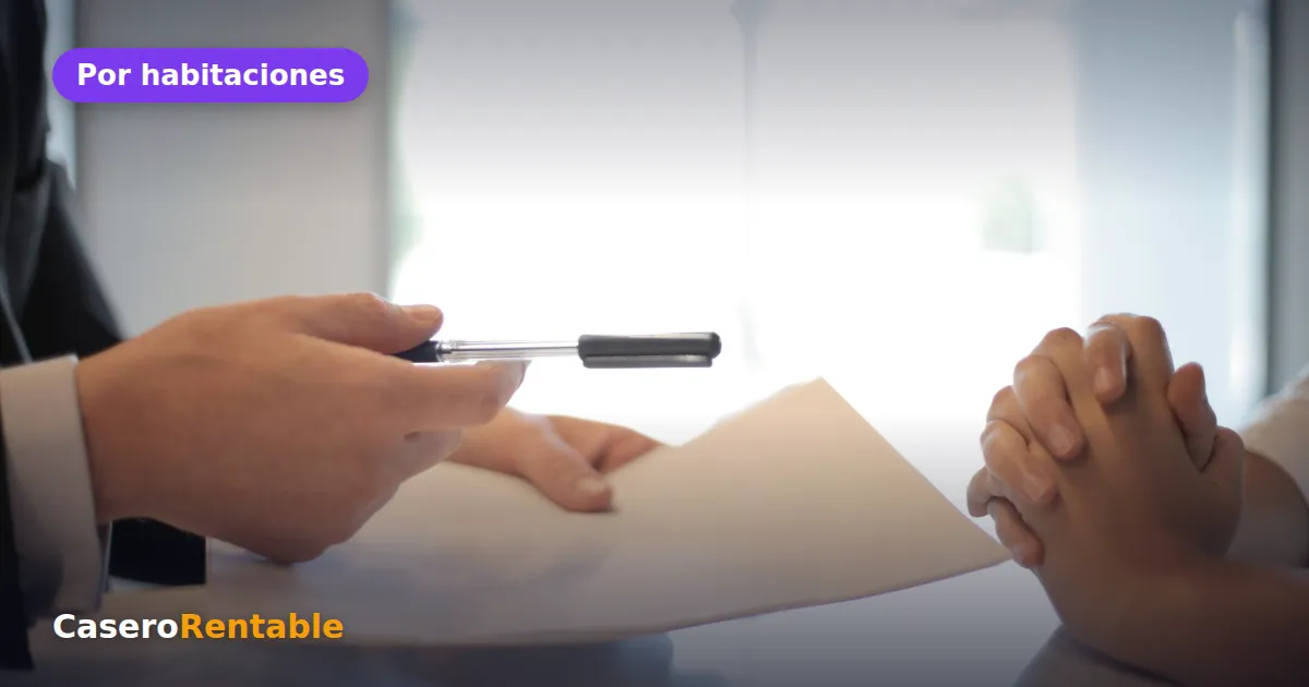 Dos personas firmando un contrato en una mesa